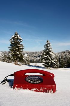 Santa Claus Hotline symbolized by a red retro phone