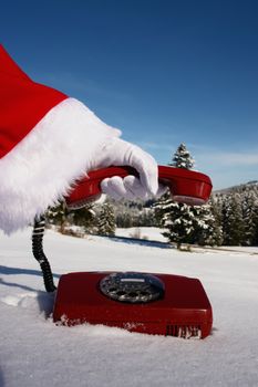 Santa Claus Hotline symbolized by a red retro phone
