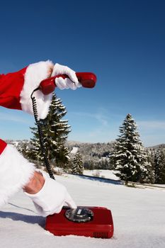 Santa Claus Hotline symbolized by a red retro phone