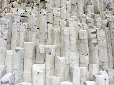 Gray basalt column formation rocks in Iceland