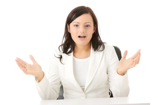 Closeup portrait of woman sitting at the desk isolated