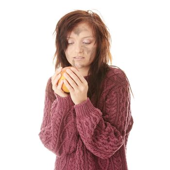 Young dirty caucasian woman with apple isolated on white background