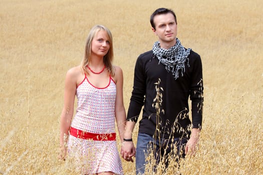 Young couple in grain field