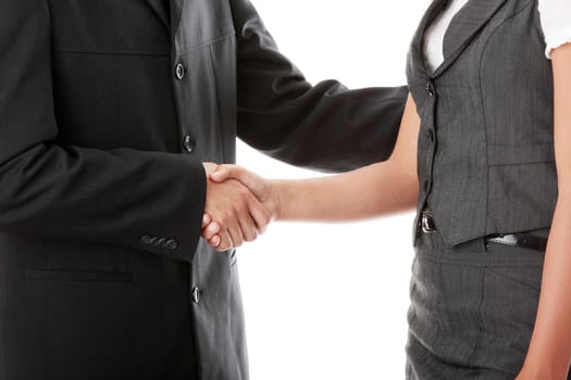 Young business couple handshaking isolated on white
