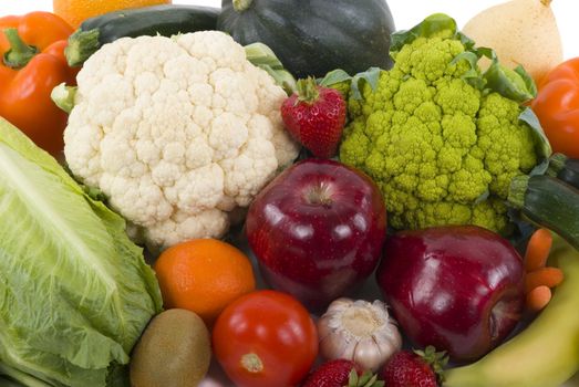 Different kinds of vegetables and fruits on white background