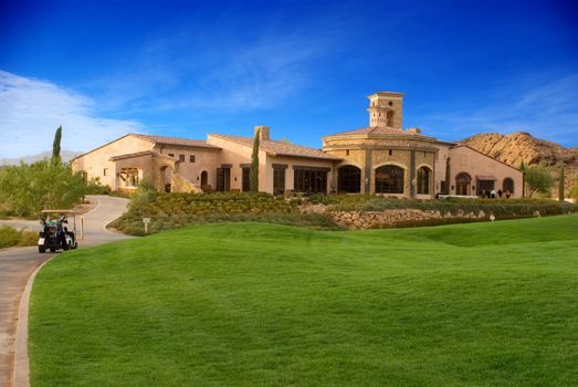 Golf course and club house during sunset