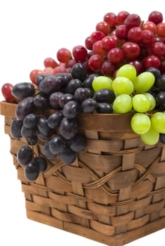 Colorful grapes in a basket