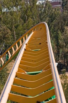 close up of rollercoaster track curving down