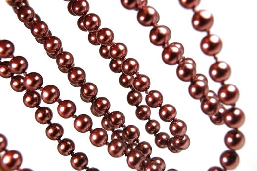 Brown beads pearls isolated on white