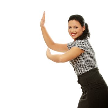 Businesswoman pushing something imaginary isolated on a white background