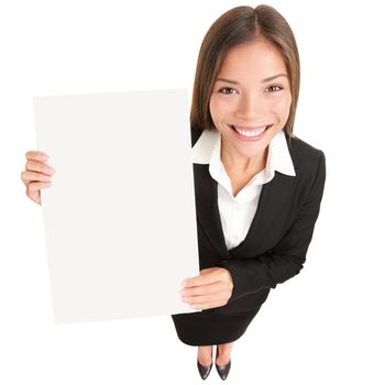 Business woman showing sign. Young Asian businesswoman in suit showing blank sign poster with copy space. Beautiful young female model isolated on white background in full length.