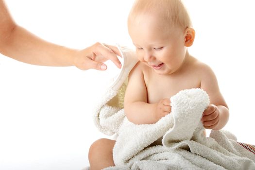 Baby after bath. Cheerful child isolated