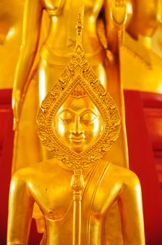 Golden buddha statue at thai temple