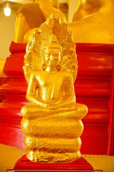 Golden buddha statue at thai temple