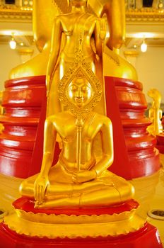 Golden buddha statue at thai temple