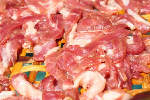 bacon drying in the sun