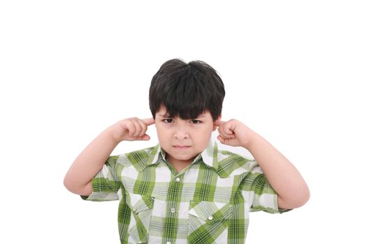 Photo of a boy with his fingers in his ears.