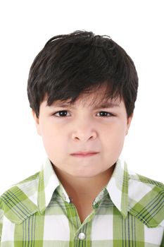 Portrait of beautiful little boy with serious look isolated on white background