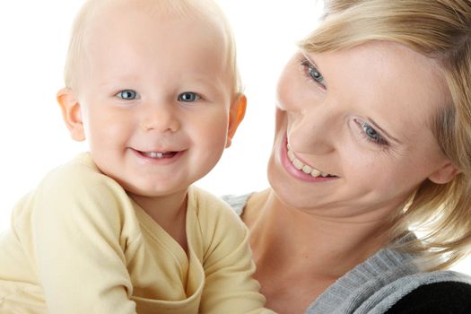 Bright closeup portrait of adorable baby boy and his mom