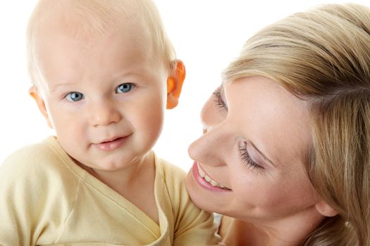 Bright closeup portrait of adorable baby boy and his mom