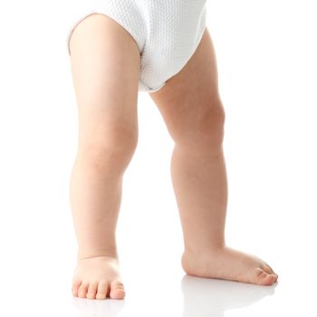 Baby legs isolated on white background