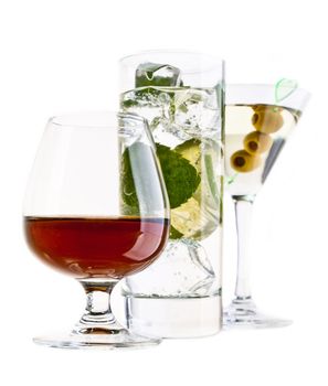 Various cocktails and alcohol on white background