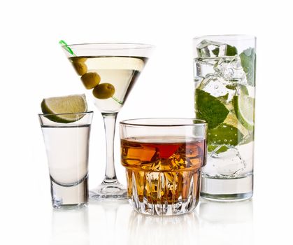 Various cocktails and alcohol on white background