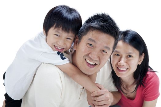 Happy Asian family on white background