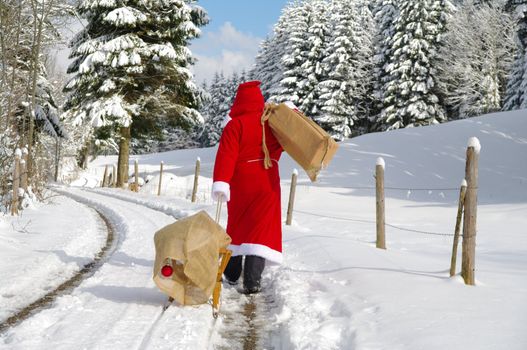 Santa Claus, Father Christmas in a beautiful winter landscape