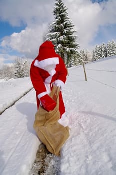 Santa Claus, Father Christmas holds red present