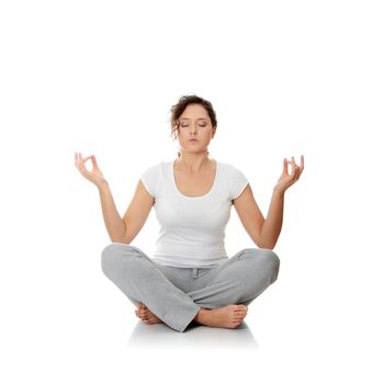 Young woman doing yoga exercise, isolated on white