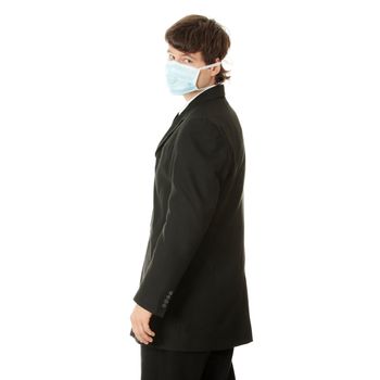 Portrait of businessman wearing protective mask on his face