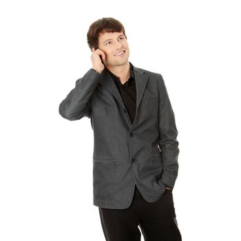A handsome happy business man using mobile phone, isolated on white