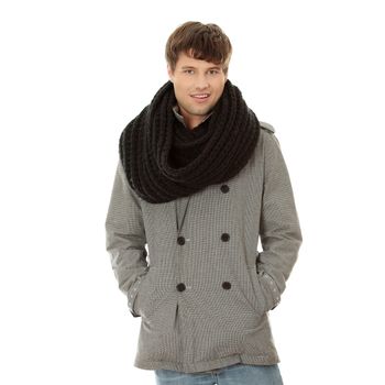 Portrait of handsome man in scarf and coat. Isolated on white background