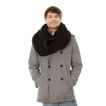 Portrait of handsome man in scarf and coat. Isolated on white background
