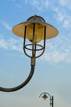 Low angle view at lamppost over blue sky