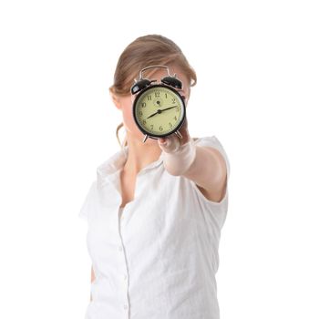 A young woman with alarm clock isolated