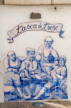 Ceramics in a wall of restaurant, Sesimbra, Portugal