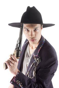 young asian man with a cowboy hat on and a pistol in his hand