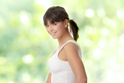 Beautiful young woman doing exercise