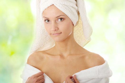 Relax concept:  beautiful woman with soft skin in bathrobe