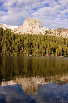 reflection in mountain lake at dawn on the Minarets at Mammoth Lake, California