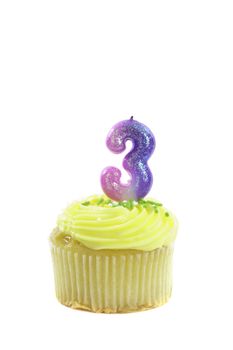 cupcake, isolated on white with a decorative candle in the shape of a number three