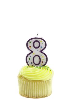 cupcake, isolated on white with a decorative candle in the shape of a number eight