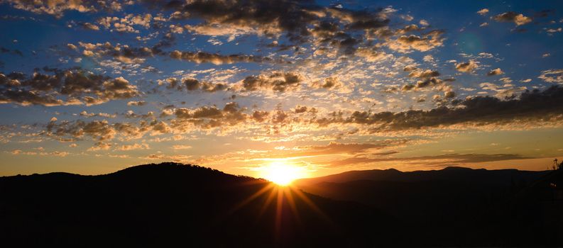 panorama of a sunrise above Park City, Utah, USA