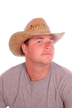  closeup headshot of an attractive  young man in straw cowboy hat isolated on a white background