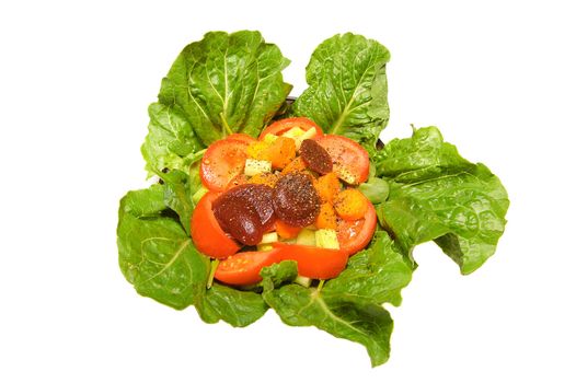 tomato, beet, carrot and lettuce salad in a bowl isolated on a whte background