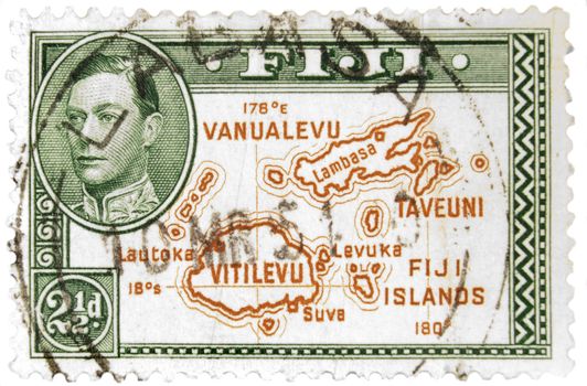 Fiji - Circa 1950 : A vintage Fijian postage stamp image of a map of the islands with inset of King George and a face value of 2 1/2 pence, series circa 1940