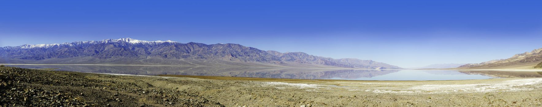 seasonal lake that forms during the winter rains in Death Valley which is surrounded by mountains