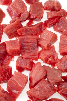 food series: cube sliced raw meat over white